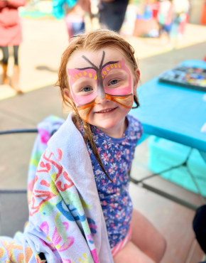 Girl with butterfly painted on face