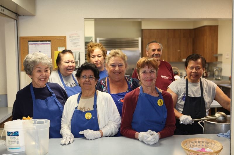 Seniors Serving Food